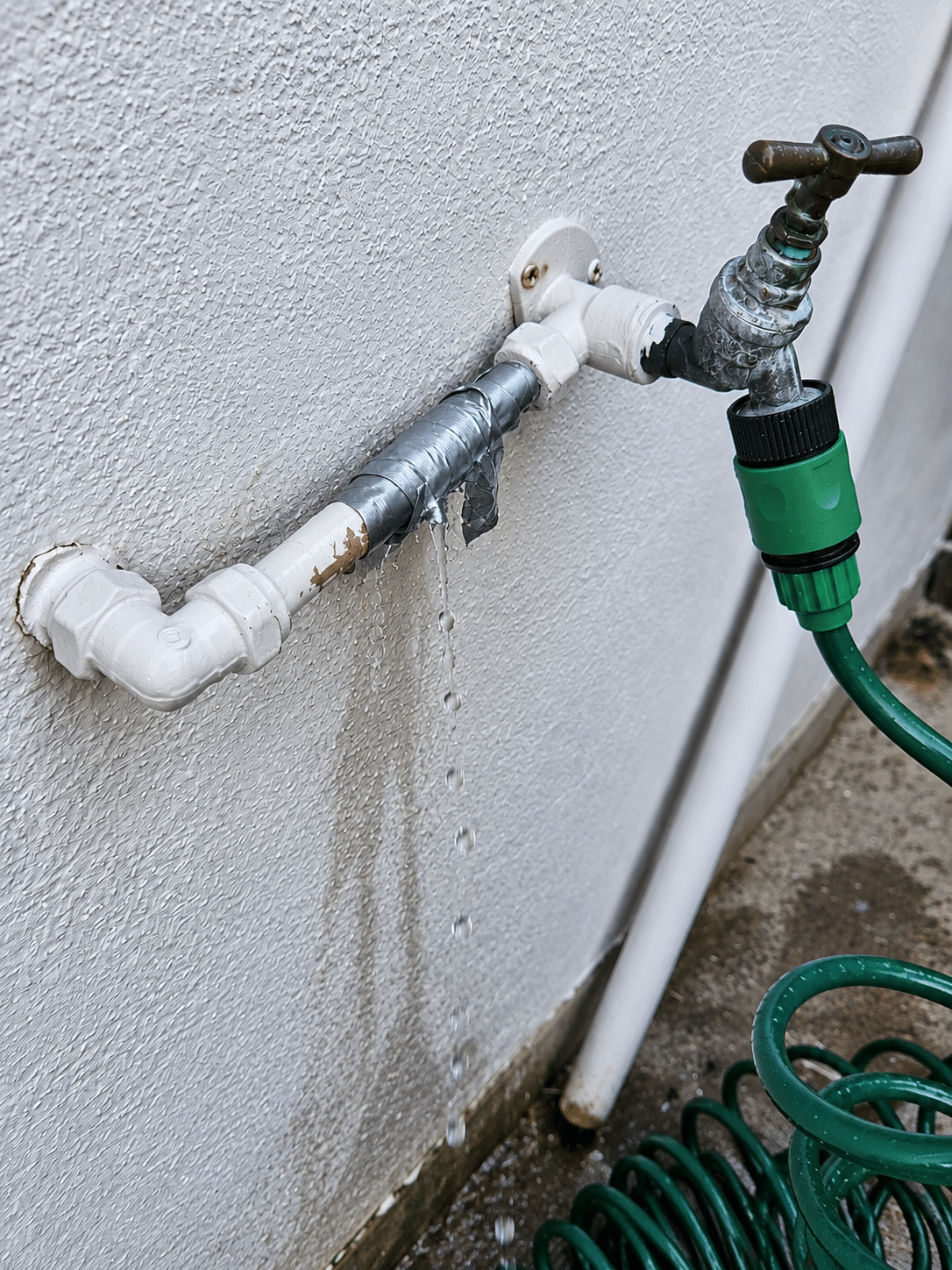 Emergency plumber in South Dublin arriving at a house with a leak