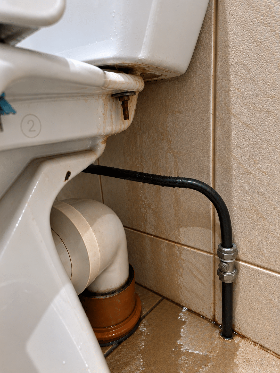 Emergency plumber in Leixlip, Co. Kildare, repairing a toilet cistern
