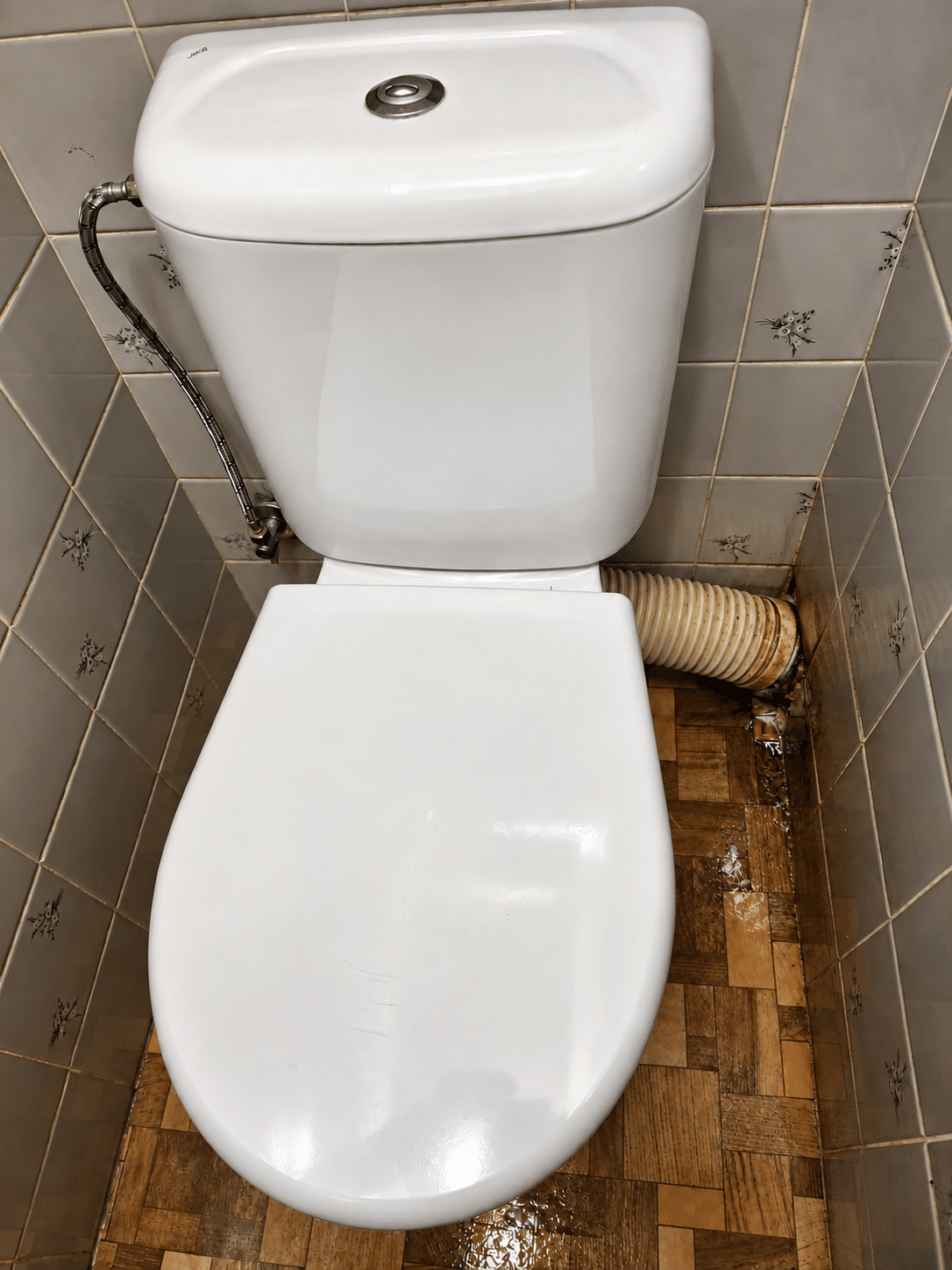 Emergency plumber in Ranelagh fixing a leaking valve under a bathroom basin